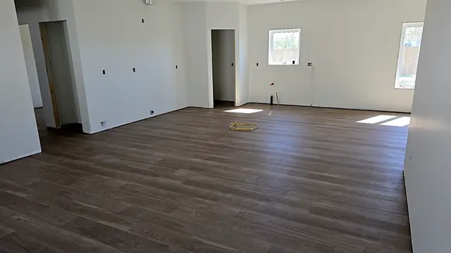 Open room with new plank flooring